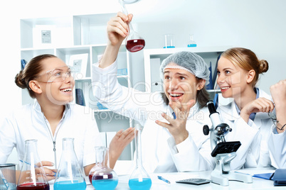 Young scientists working in laboratory