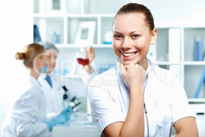 Young scientists working in laboratory Young scientists working in laboratory