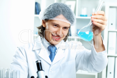 Young scientist working in laboratory