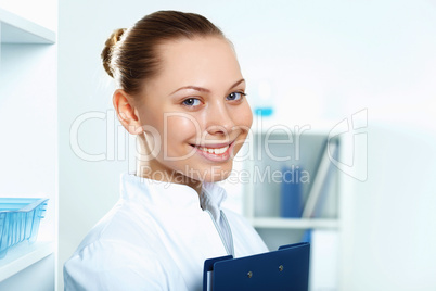 Young doctor in white uniform