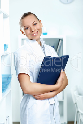 Young doctor in white uniform