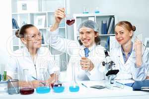 Young scientists working in laboratory