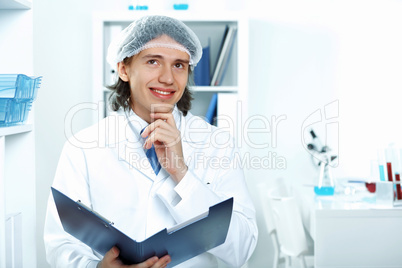 Young doctor in white uniform