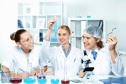 Young scientists working in laboratory