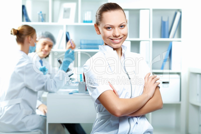Young scientists working in laboratory Young scientists working in laboratory