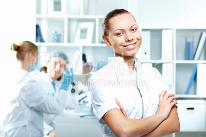Young scientists working in laboratory Young scientists working in laboratory