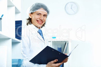 Young doctor in white uniform