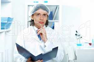 Young doctor in white uniform