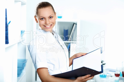 Young doctor in white uniform