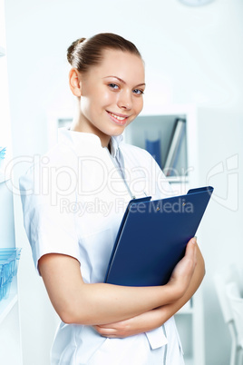 Young doctor in white uniform