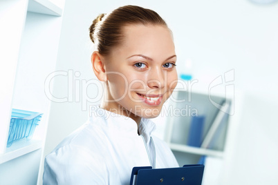 Young doctor in white uniform