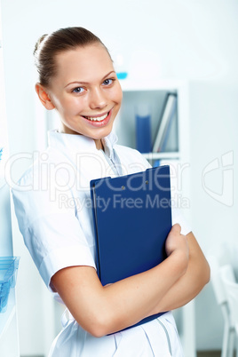 Young doctor in white uniform