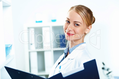 Young doctor in white uniform