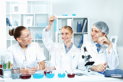 Young scientists working in laboratory