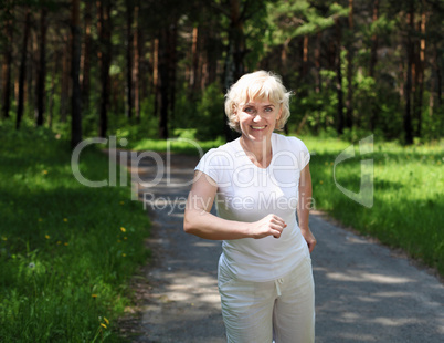 Elderly woman likes to run in the park