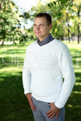 Young man in summer park