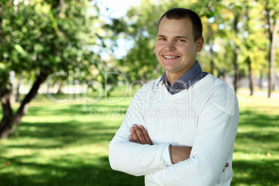 Young man in summer park