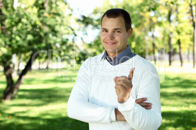 Young man in summer park