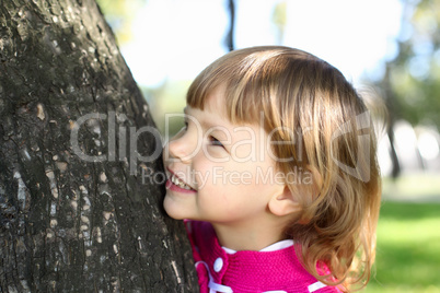 Little girl in summer park Little girl in summer park
