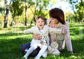 Grandmother with her little granddaghter in park