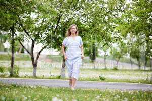 Young blond woman in the park