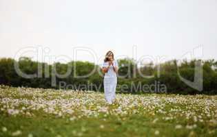 Young blond woman in the park