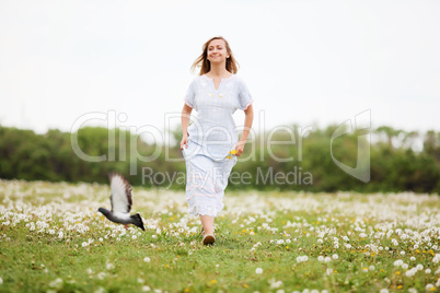 Young blond woman in the park