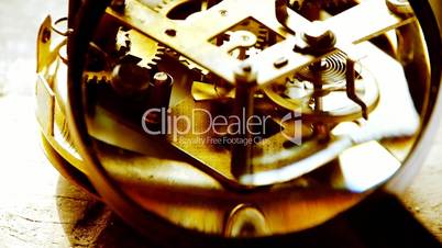 Magnifying glass to enlarge internal structure of Watch,bearings,gears.