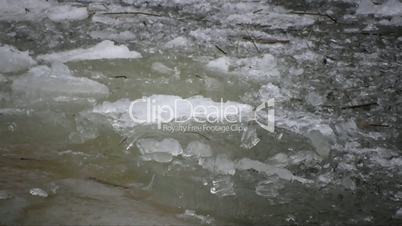 drifting of ice cracked on river waves