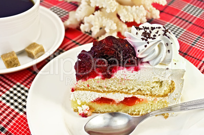 Cake in a plate with coffee and coral