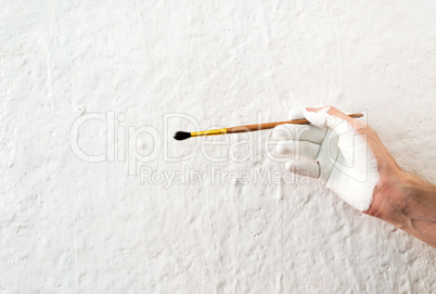 Painting the walls with white paint