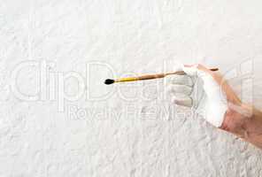 Painting the walls with white paint