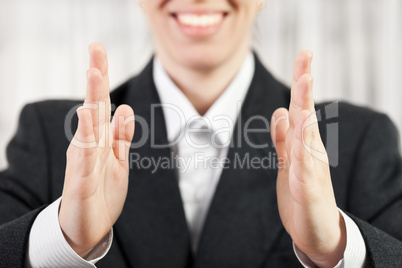 Businesswoman hand showing middle size