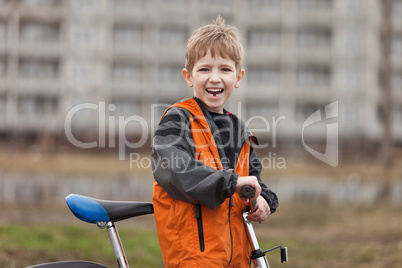 Child with bicycle