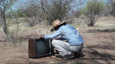 Woman out in the Boonies with Old TV