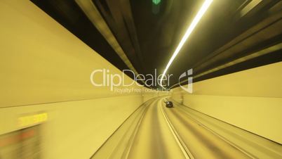 car driving fast in tunnel