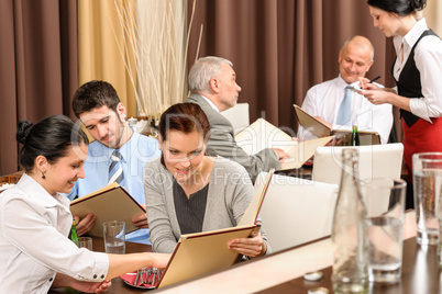 Business lunch executives looking menu restaurant