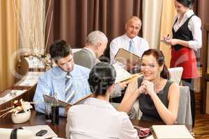 Business lunch executives look menu restaurant