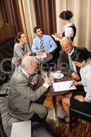 Business meeting executives dealing at restaurant