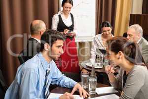 Businesspeople conference room waitress take order