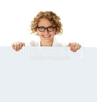 Female business professional holding blank billboard