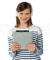 Smiling pretty girl holding i-pad
