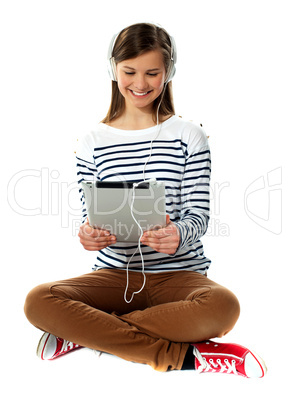 Girl watching video on her tablet