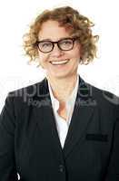 Cropped image of a curly haired business lady
