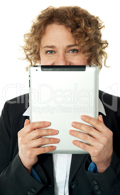 Corporate lady hiding her face with ipad