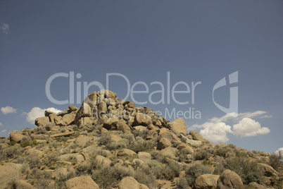 Rock boulders with a blue sky in the back ground