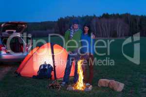 Tent camping car couple stand by bonfire