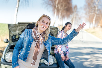 Car defect two women wait for help