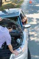 Car troubles couple starting broken vehicle