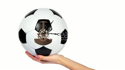 Soccer Ball Clock on the hand, on the white background, Timelapse
